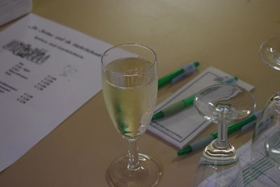 High angle view of wine in glass on table