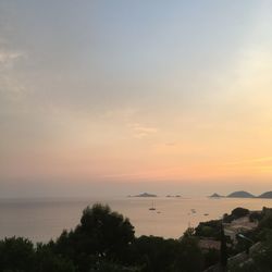 Scenic view of sea against sky during sunset