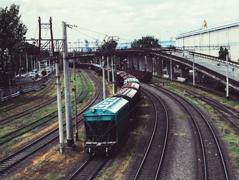 High angle view of old train on railroad tracks against sky