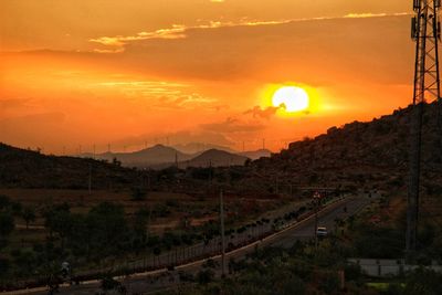 Scenic view of landscape against sky during sunset