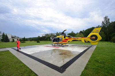 View of motorcycle on land against sky