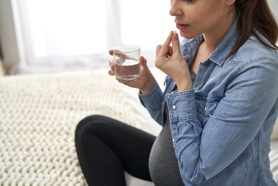 Young woman using mobile phone