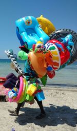 Multi colored toy on beach