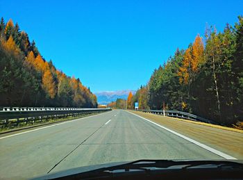 View of country road against sky