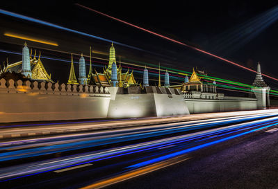 High angle view of light trails on road at night