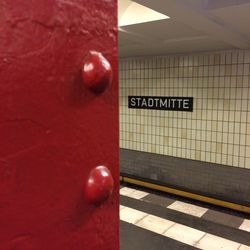 Close-up of text on subway station