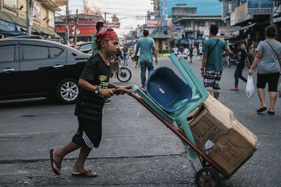 Full length of woman standing in city