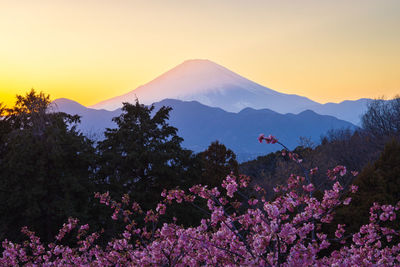 Scenic view of mountains against sky during sunset