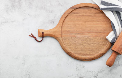 High angle view of carving on table against white background