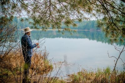 Man fishing at lake