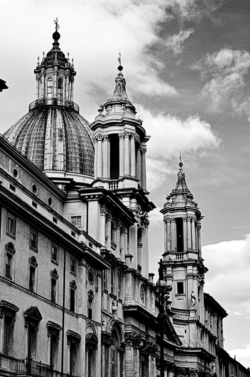 architecture, building exterior, religion, place of worship, built structure, church, low angle view, spirituality, cathedral, sky, famous place, travel destinations, dome, clock tower, tourism, travel, city, facade