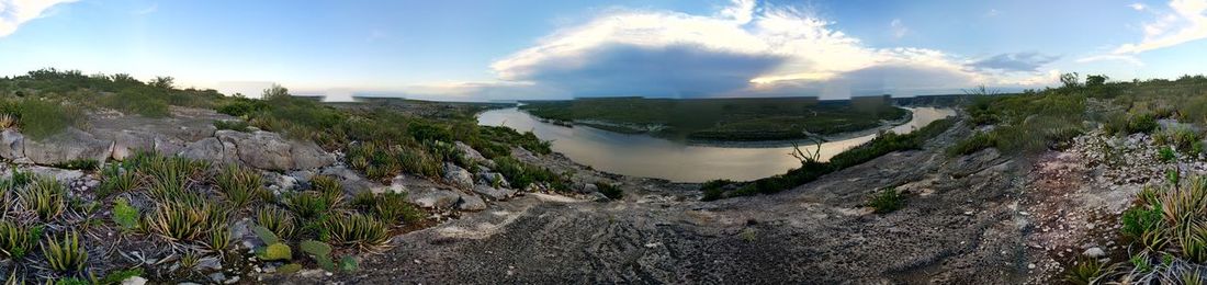 Panoramic view of river against sky