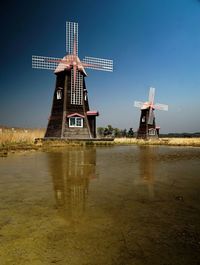 Traditional windmill against the sky