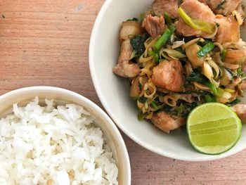 Directly above shot of chopped vegetables in bowl on table