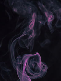 Close-up of smoke against black background