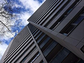 Low angle view of modern building against sky