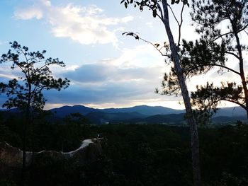 Scenic view of silhouette mountains against sky