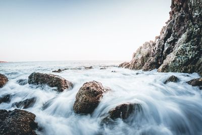 Scenic view of sea against clear sky