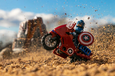 Close-up of toy car on field