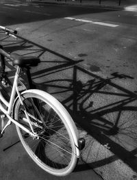 Bicycle parked on road