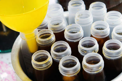 High angle view of bottles on table