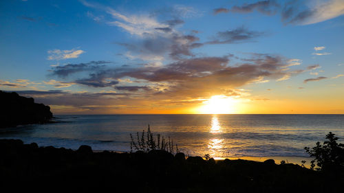 Scenic view of sea against sky during sunset