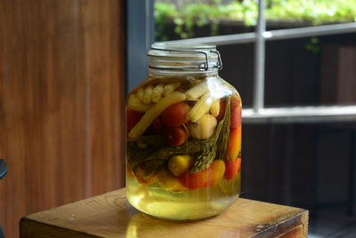 Pickled jar on stool