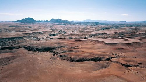 Scenic view of dramatic landscape against sky