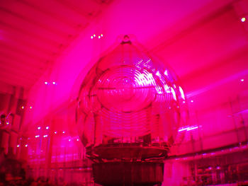 Low angle view of illuminated light bulbs in restaurant