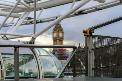 Bridge in city against sky