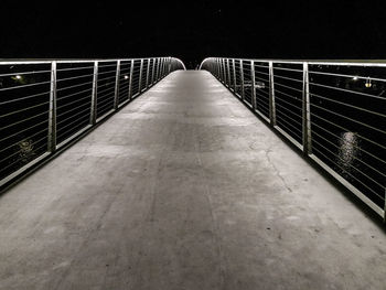 Empty footbridge at night