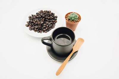 High angle view of coffee cup on table