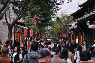 People walking on street in city