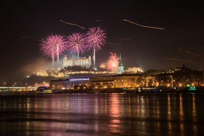 Firework display at night