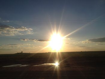 Sun shining through clouds