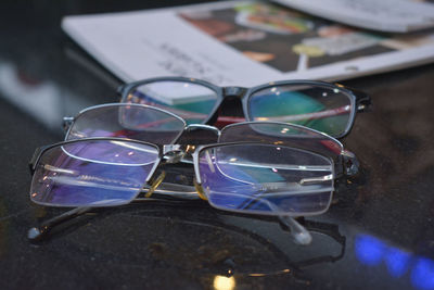 Close-up of sunglasses on table