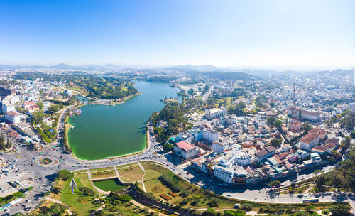 High angle view of river amidst buildings in city