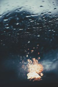 Full frame shot of raindrops on sea