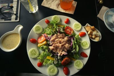 Directly above shot of salad served on table