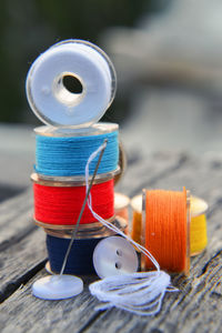 Close-up of multi colored candles on table