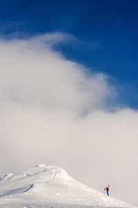 Scenic view of snowcapped mountain against sky