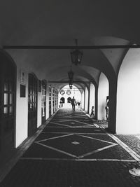 People walking on footbridge