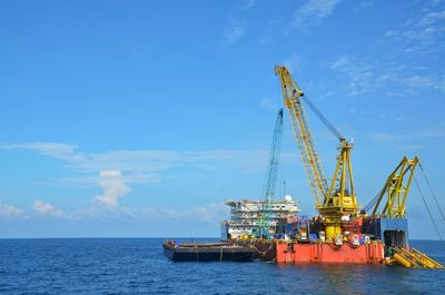 View of sea against blue sky