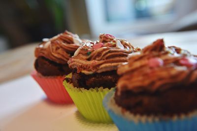 Close-up of cupcakes on table