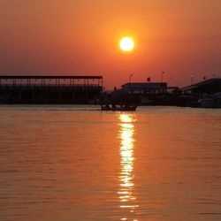 Scenic view of sea at sunset