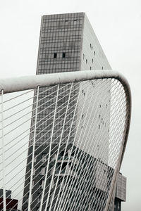 Low angle view of modern building against clear sky