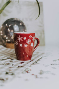 Close-up of coffee cup on table