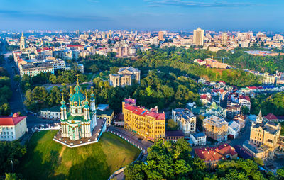 High angle view of buildings in city against sky