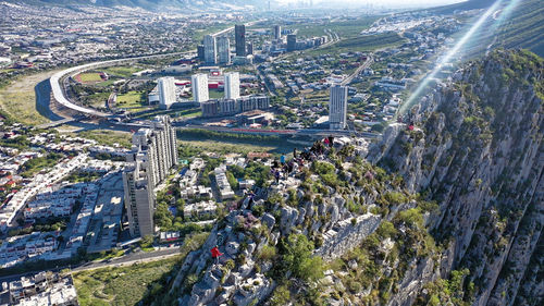 High angle view of street amidst buildings in city