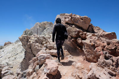 Low angle view of rock formation against clear sky